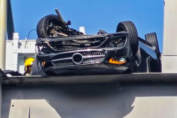 Driver escapes injury after Mercedes flips over on Hong Kong’s Tsing Ma Bridge